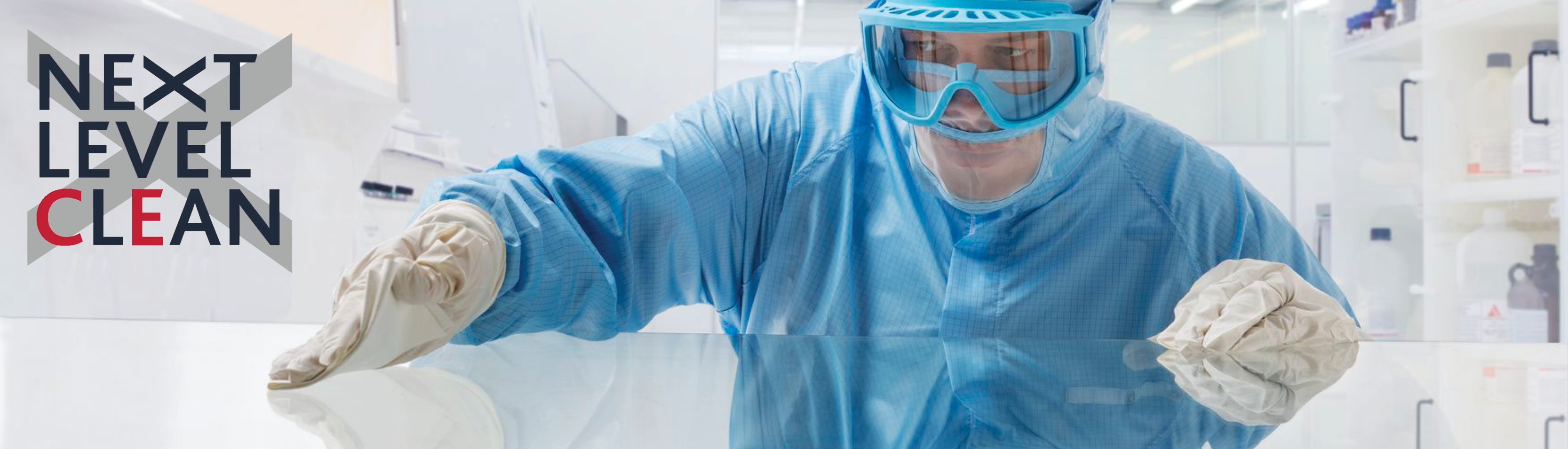 man-in-protective-suit-wiping-table_2.jpg man-in-protective-suit-wiping-table_2.jpg